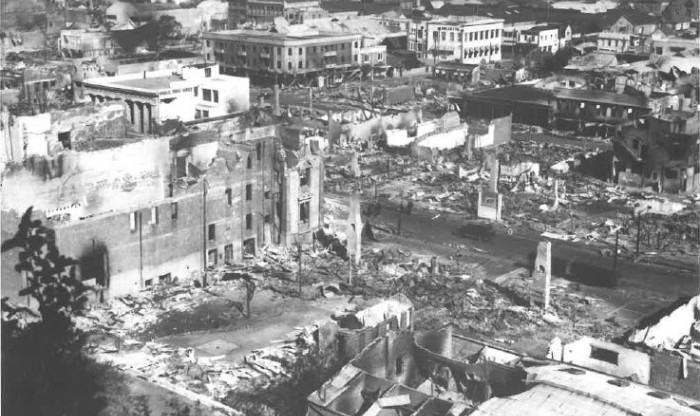 Black and white historic photo of damage to napier town after an earthquake