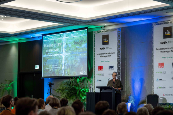 Wendy presenting at a conference